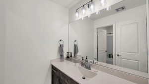 Bathroom featuring vanity