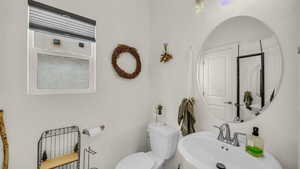 Bathroom with toilet and a sink