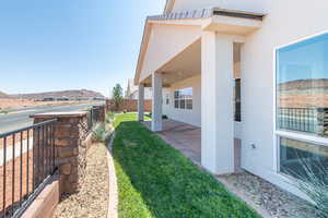 View of yard featuring a mountain view and a patio area