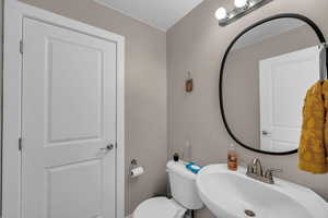 Bathroom with a sink and toilet