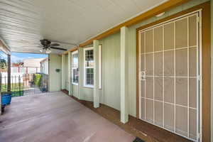 View of patio with ceiling fan