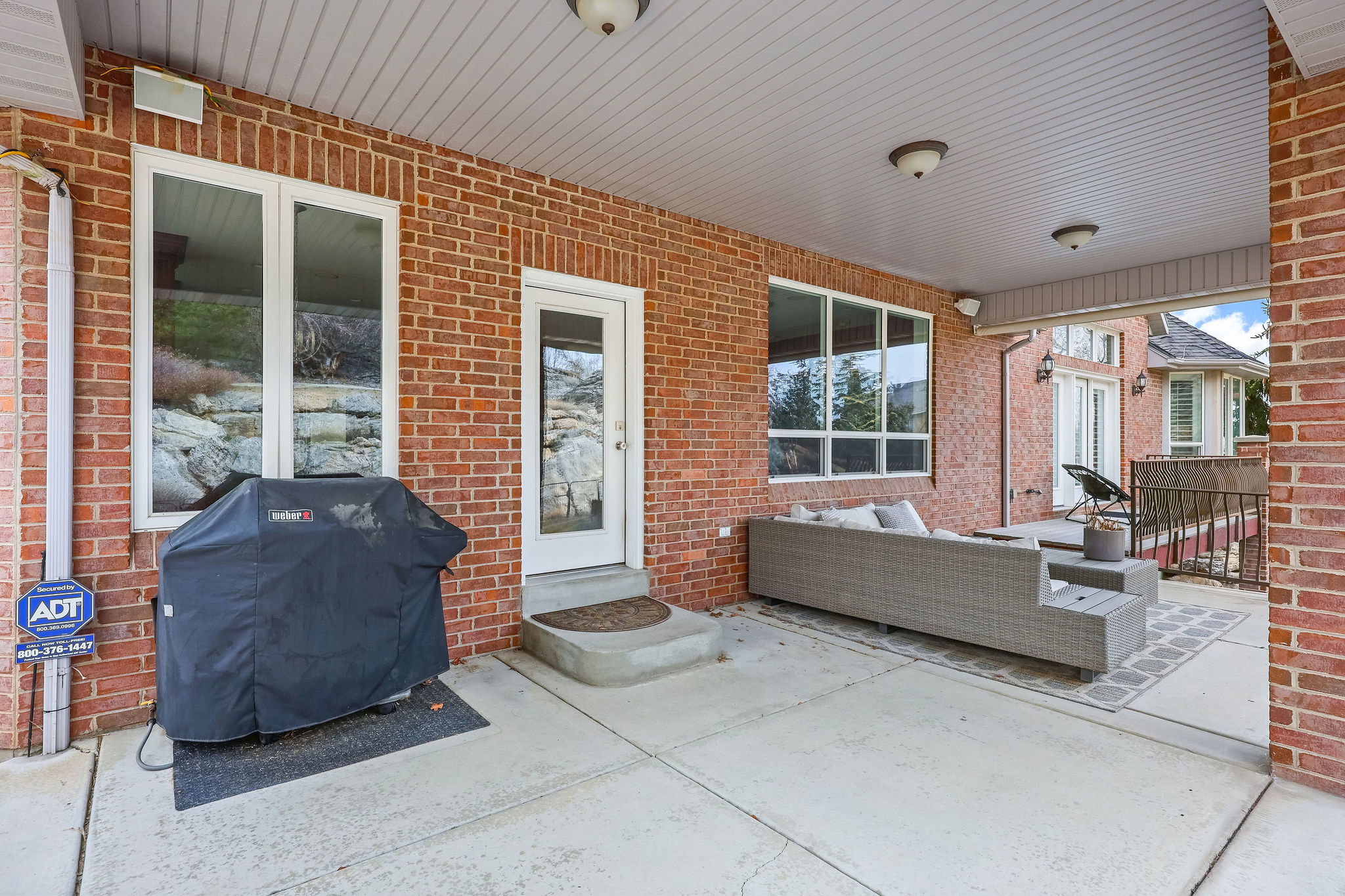 View of patio featuring grilling area and an outdoor living space