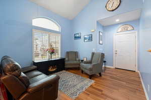 Bright, open living space with vaulted ceilings and abundant natural light