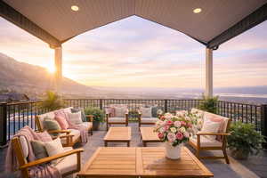 Balcony at dusk featuring a patio area, outdoor seating, and a view of the sunrise east views, Sunsets west view and southern view of the valley!