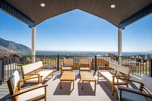 View of patio featuring a mountain view and outdoor seating
