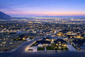 Aerial view at dusk of a mountain view and a residential view