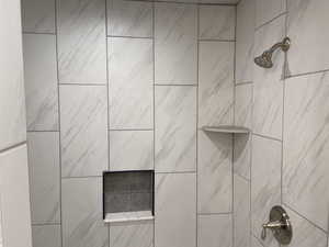 Bathroom view of tiled shower