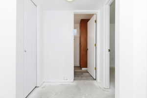 Hallway with concrete floors