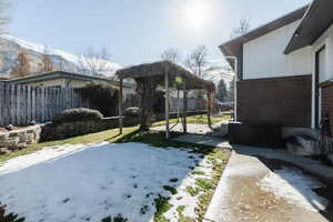 Fenced backyard featuring a patio area