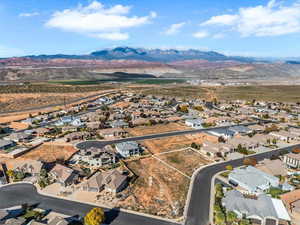 Aerial view of residential area with a mountain backdrop