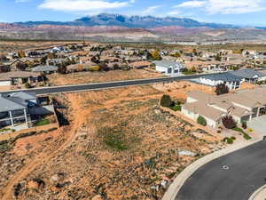 Aerial view of residential area with a mountainous background