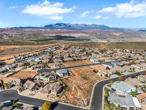 Aerial perspective of suburban area featuring mountains