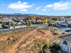 Aerial perspective of suburban area with mountains