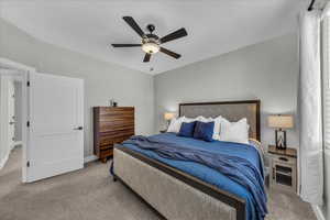 Bedroom with carpet floors and a ceiling fan