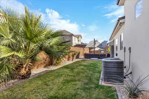 Fenced backyard featuring an outdoor lounge area