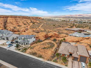 Aerial perspective of suburban area with mountains