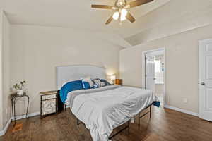 Primary bedroom with private access to the ensuite bathroom and generous closet space.