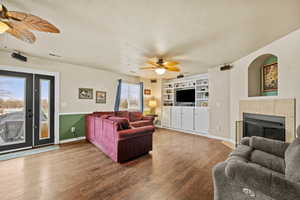 Family room with access to the backyard and plenty of space for gathering or movie nights.