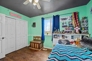 Another view of the bedroom highlighting the closet and comfortable layout.