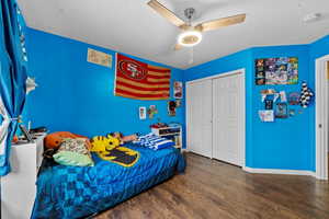 Another view of the spacious secondary bedroom with closet and ample floor space.