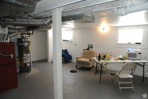 Below grade area with secured water heater and heating unit