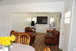 Living area featuring wood finished floors