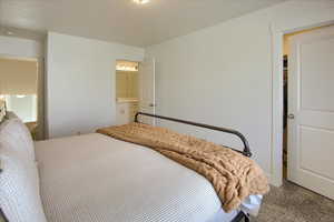 Bedroom featuring ensuite bath