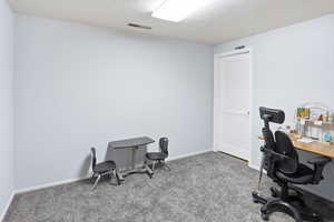 Currently set as an office, this could also be a bedroom.