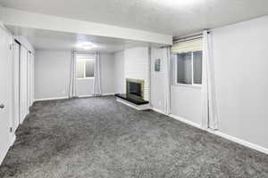 This room has a fireplace and could also be used as a living room or primary bedroom ensuite.