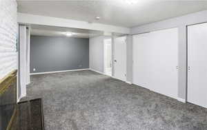 This room has a fireplace and could also be used as a living room or primary bedroom ensuite.
