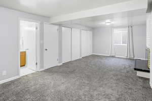 This room has a fireplace and could also be used as a living room or primary bedroom ensuite.