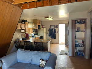 Living room with light wood-type flooring