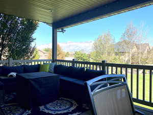 Deck featuring an outdoor lounge area and a mountain view