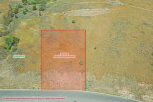 Aerial overview of property's location with property boundaries highlighted