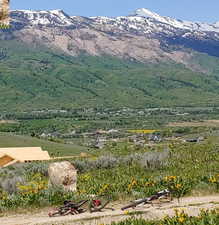 View of mountain background featuring rural landscape