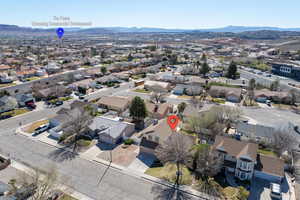 Aerial view of residential area with a mountainous background