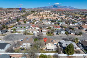 Aerial view of residential area with a mountain backdrop