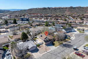 Aerial perspective of suburban area featuring mountains