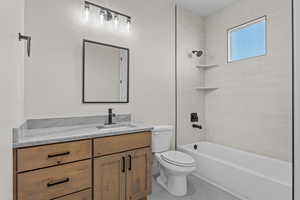 Full bathroom with vanity and  shower combination