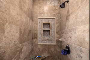 Bathroom view of a tile shower