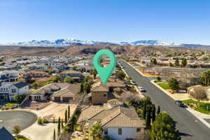 Aerial perspective of suburban area with mountains