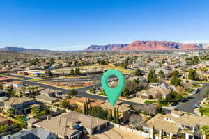 Aerial view of residential area with a mountainous background