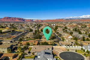 Aerial view of residential area with mountains