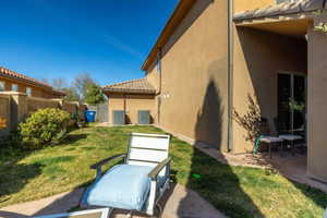 Fenced yard with a patio