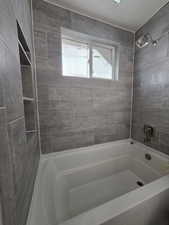 Bathroom featuring shower / tub combination