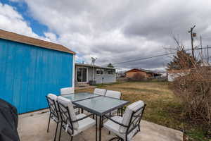View of patio featuring outdoor dining area