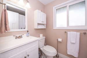 Bathroom featuring vanity and a shower with shower curtain