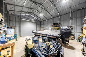 Garage featuring metal wall