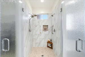 Full bath with a shower stall