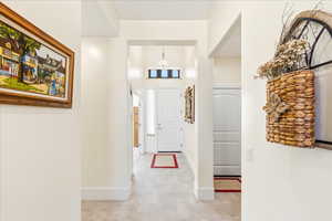 Foyer featuring baseboards
